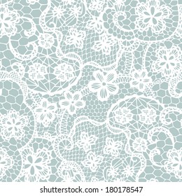 Lace seamless pattern with flowers on blue background