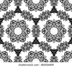 Lace seamless pattern with flowers on white background. Lace repeating floral pattern  Orient traditional background. Lace unusual ornament. Indian, islamic, asian, ottoman, arabic motif. 