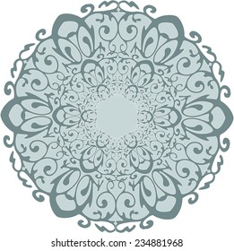 Lacy light blue circular ornament with floral motifs