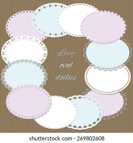 Lacy oval doilies set. Pastel colors.