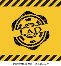 Lad black grunge emblem inside yellow warning sign. Vector Illustration. Detailed.