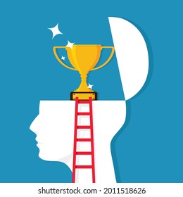 Una escalera conduce a una cabeza humana con un trofeo. El concepto de desarrollo conduce al éxito