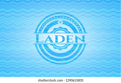 Laden light blue water style emblem.