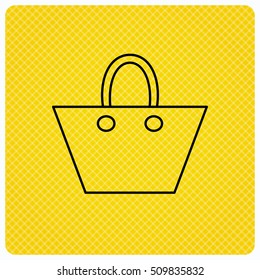 Ladies handbag icon. Elegance women accessory sign. Linear icon on orange background. Vector