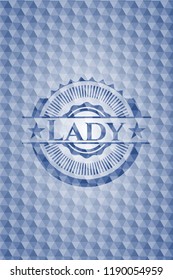 Lady blue badge with geometric pattern.