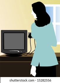 lady standing near a computer	