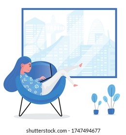 A lady is surfing internet by computer at home 