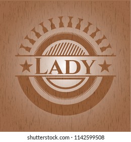 Lady wooden emblem