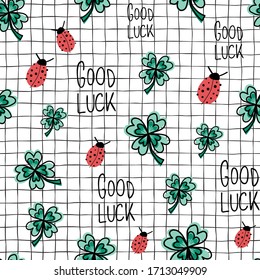 Ladybug, clover, Good Luck seamless vector background. Repeating hand drawn fortune charms on a grid pattern. Use for New Years, fabrics, packaging