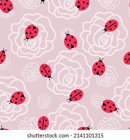 The ladybug and flowers seamless pattern
