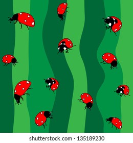 Ladybugs on green. Seamless