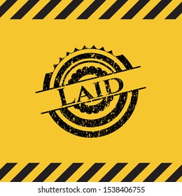 Laid grunge black emblem with yellow background, warning sign. Vector Illustration. Detailed.