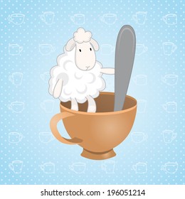 lamb sitting in a cup with a spoon