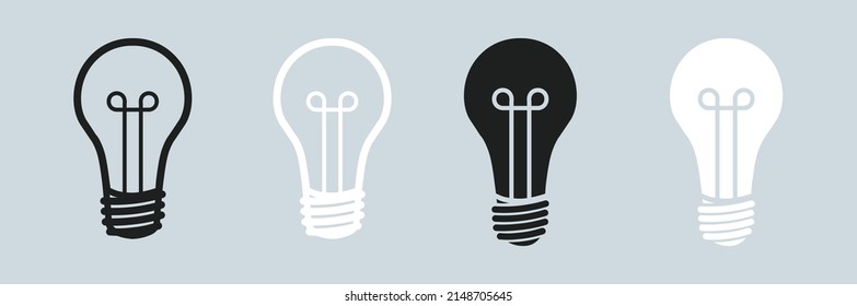 Lamp bulb idea icon set in black and white colours.