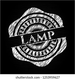 Lamp chalk emblem written on a blackboard