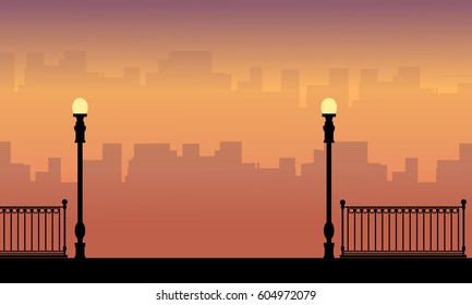 Lamp and fence landscape silhouettes