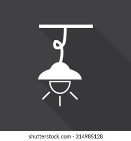 lamp icon with long shadow.