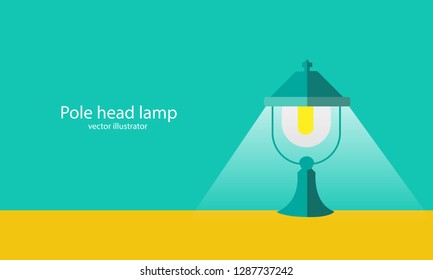 The lamp post on the wall of the house