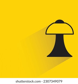 lamp with shadow on yellow background