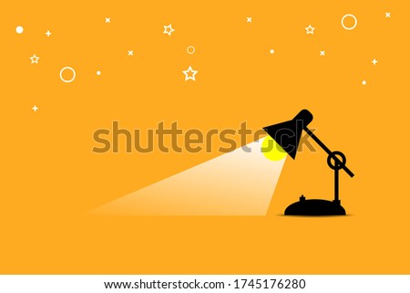 lamp shining on oreange background