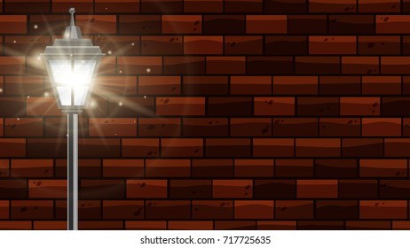 Lampenposten mit hellem Licht auf Ziegelwand