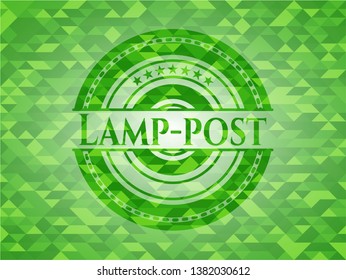 Lamp-post realistic green emblem. Mosaic background
