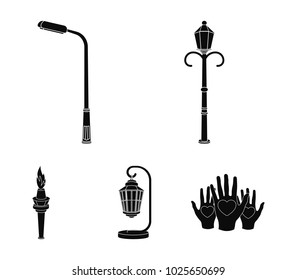 Lamppost in retro style,modern lantern, torch and other types of streetlights. Lamppost set collection icons in black style vector symbol stock illustration web.