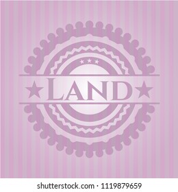 Land badge with pink background