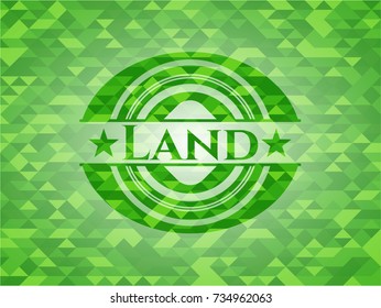 Land green emblem with mosaic background