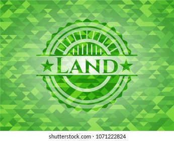  Land realistic green emblem. Mosaic background