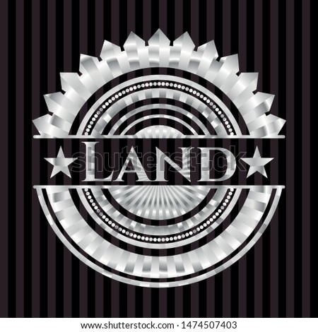 Land silvery badge or emblem. Vector Illustration. Mosaic.