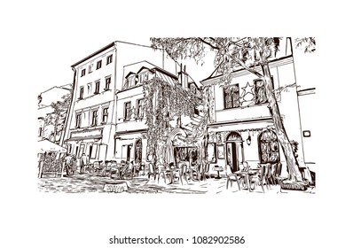 Landmark with building of Krakow, City in Poland. Hand drawn sketch illustration in vector.