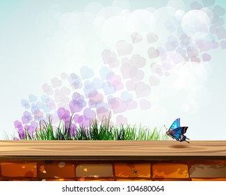 Landscape with brick wall and grass