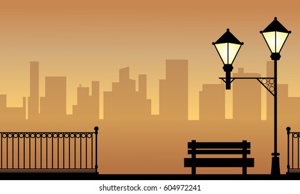 Landscape of chair with street lamp silhouette