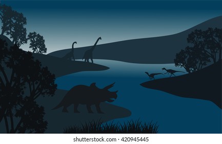 Landscape dinosaur silhouette in river at the night