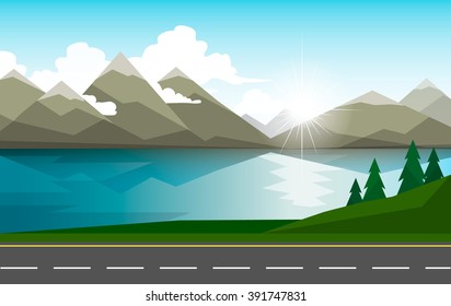 The landscape of forests, mountains, road and lake.