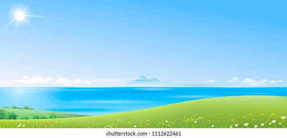 Landscape with green hills and the sea in the distance on a clear day