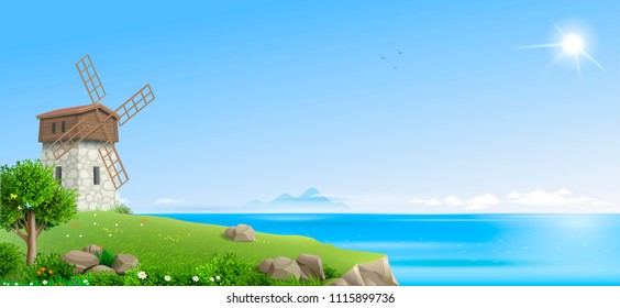 Landscape with green hills and the sea in the distance on a clear day