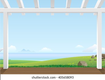 Landscape with green hills and the sea in the distance on a clear day from the pergola on the terrace