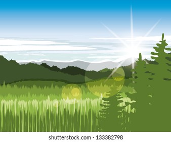 Landscape with green meadows and mountains