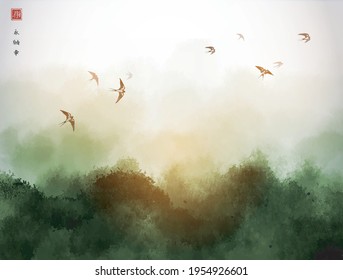 Landscape with green misty forest mountains and flock of swallow birds in the sky. Traditional oriental ink painting sumi-e, u-sin, go-hua. Hieroglyphs - eternity, freedom, happiness, joy