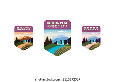 landscape logo with mountains for family owned vineyard