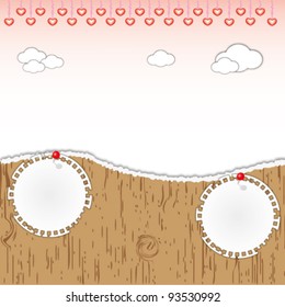 Landscape love hearts background and note pad on torn wooden pattern.