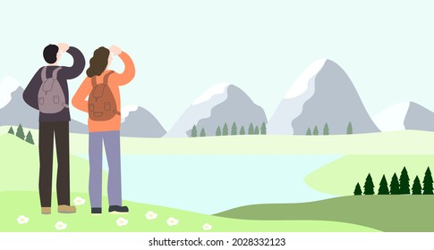 Landscape with mountains. Travelers look into the distance at the lake.