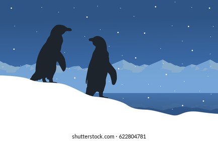 Landscape of penguin on ice silhouettes