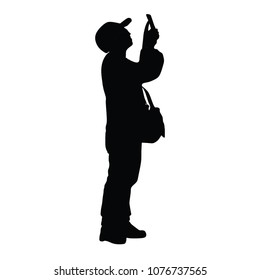 Landscape photographer without tripod vector silhouette. Tourist shooting on the city, silhouette illustration isolated on white background. Photo reporter on duty.
