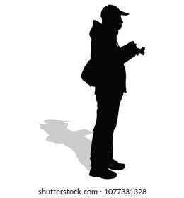 Landscape photographer without tripod vector silhouette. Paparazzi shooting, silhouette illustration isolated on white background. Photo reporter on duty.
