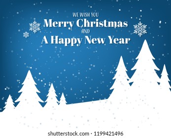 Landscape of pine trees forest on the snow hill with snowfall on blue sky with We wish you Merry Christmas and a Happy New Year text with snowflakes. Design for winter holidays season greeting card.