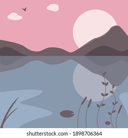 Landscape of a pond with mountains and a pink sunset in the background and plants in the foreground. A soothing and peaceful atmosphere.