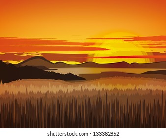 Landscape with rocky mountains at sunset
